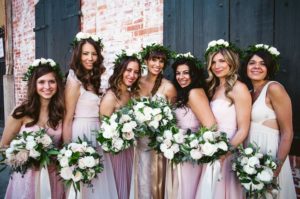 Bridesmaids’ hairstyles with flowers